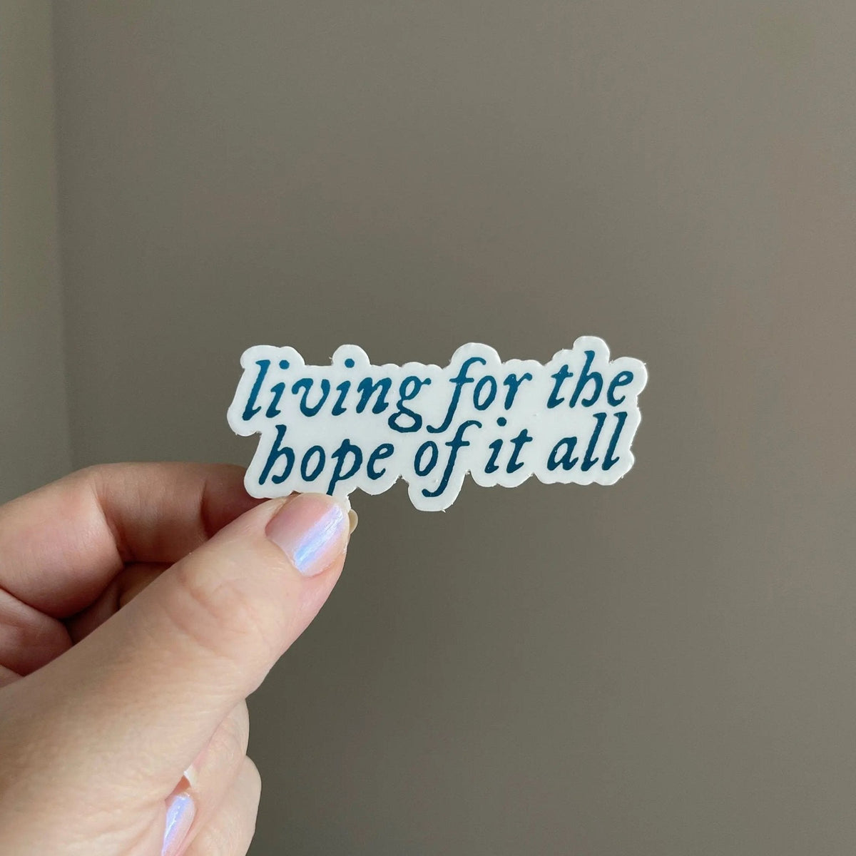 Living for the hope of it all sticker detail — close view of the teal gradient lettering by indie artist MangoIllustrated