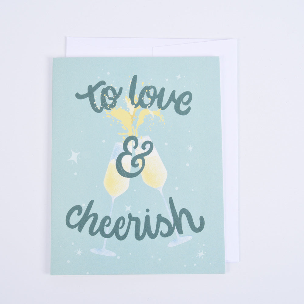 A folded greeting card with the text &