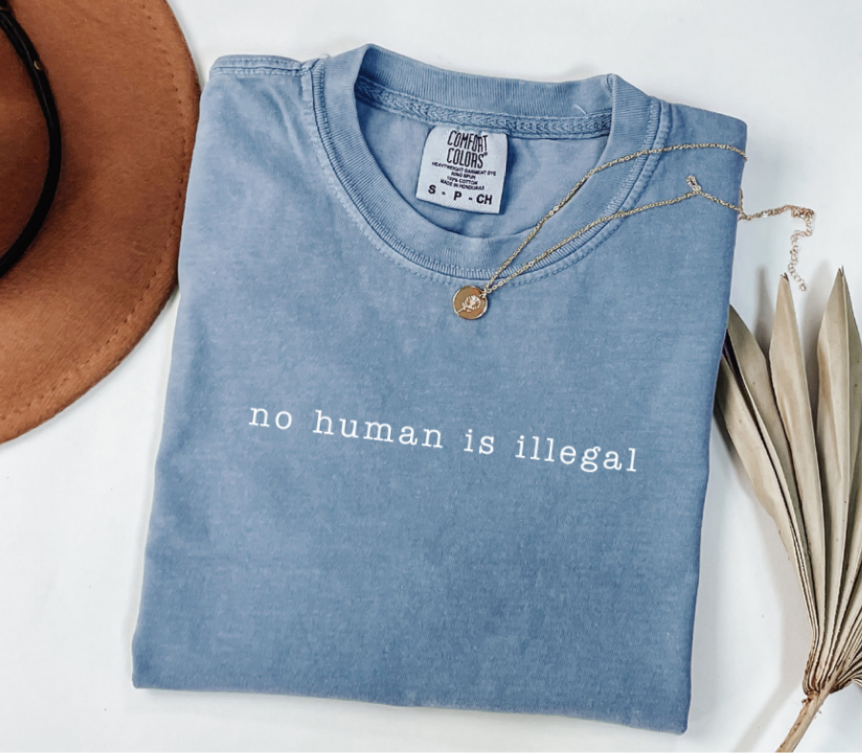 Folded blue t-shirt with &