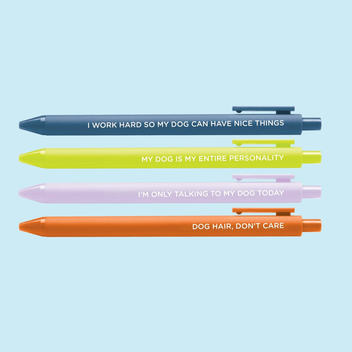 Obsessed With My Dog pen set detail — lilac and orange jotter pens with black gel ink by indie artist MangoIllustrated