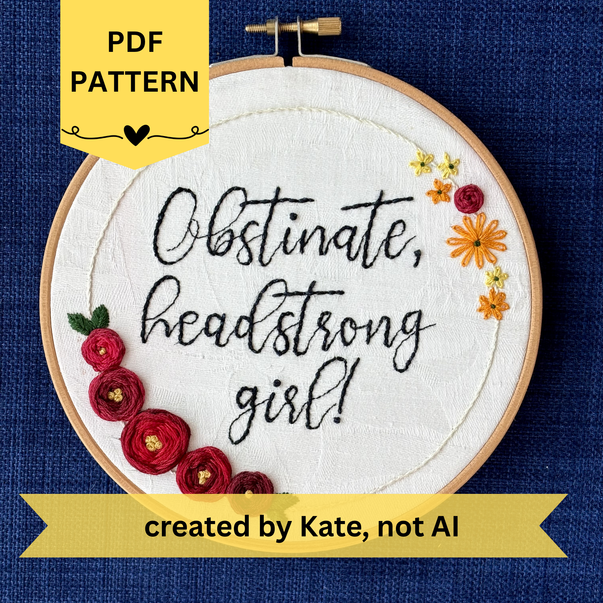 PDF Pattern created by Kate, not AI. "Obstinate, headstrong girl!" Quote hand embroidered in sparkle black thread surrounded by a floral wreath with red roses and yellow and orange daisies. Fabric is white damask. Embroidery is displayed as wall art in light wood embroidery hoop.
