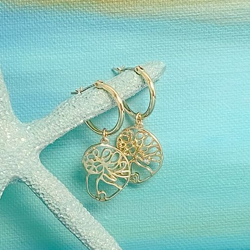 ocracoke natica shell drop hoop earring on teal painted background with light teal sea startbabe0004-gold