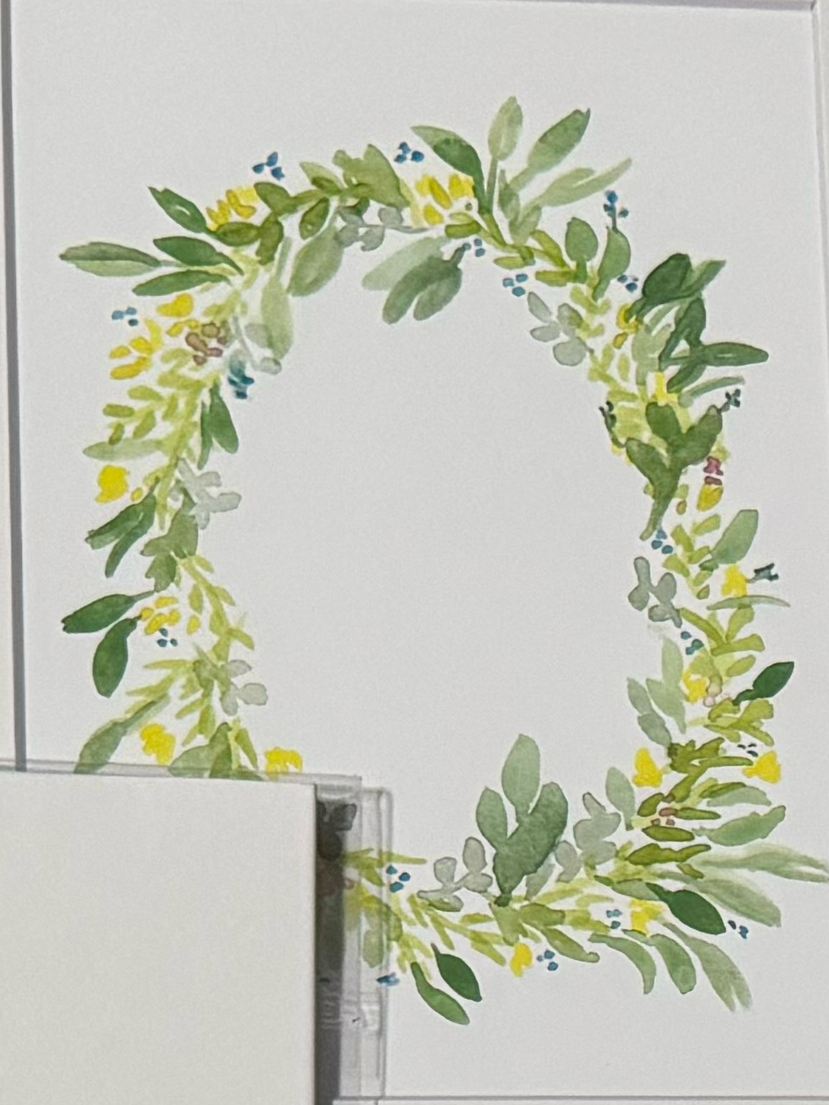 Floral wreath design on a white background