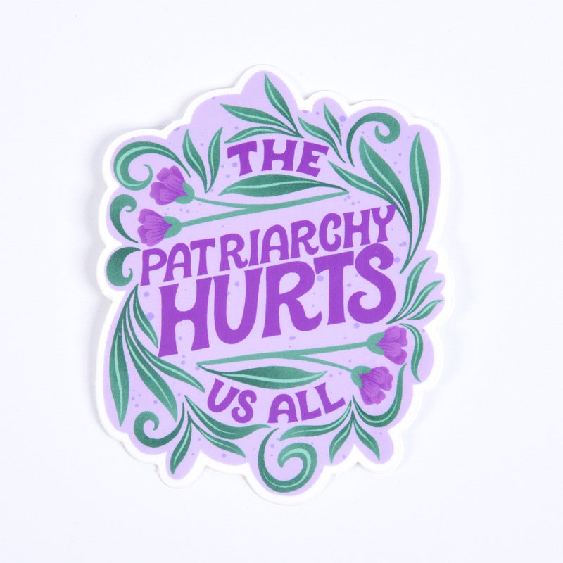 A sticker with a purple background and the text &