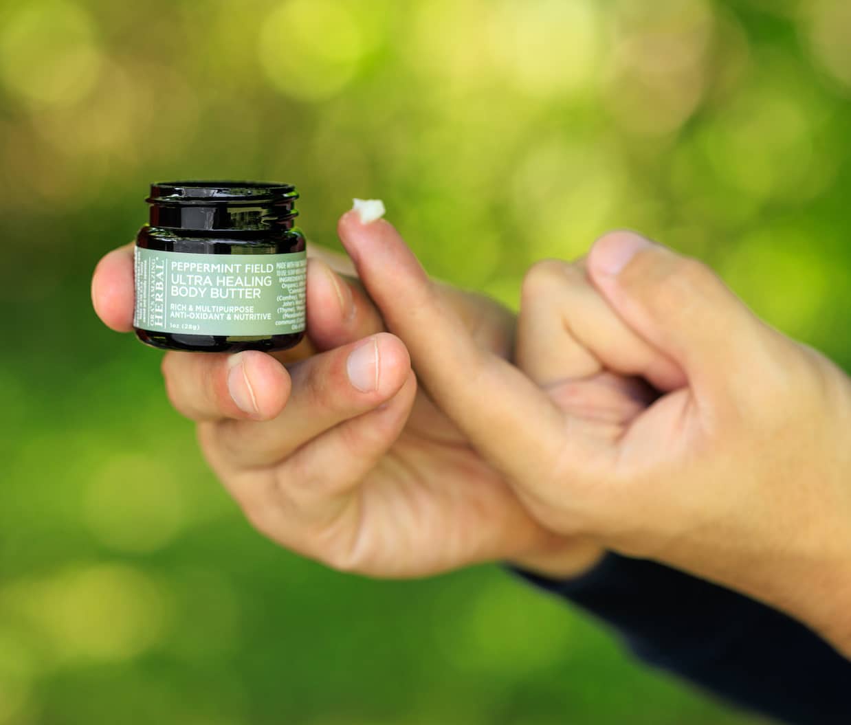 Peppermint Field Body Butter 1oz Lifestyle Outdoor Human Hand