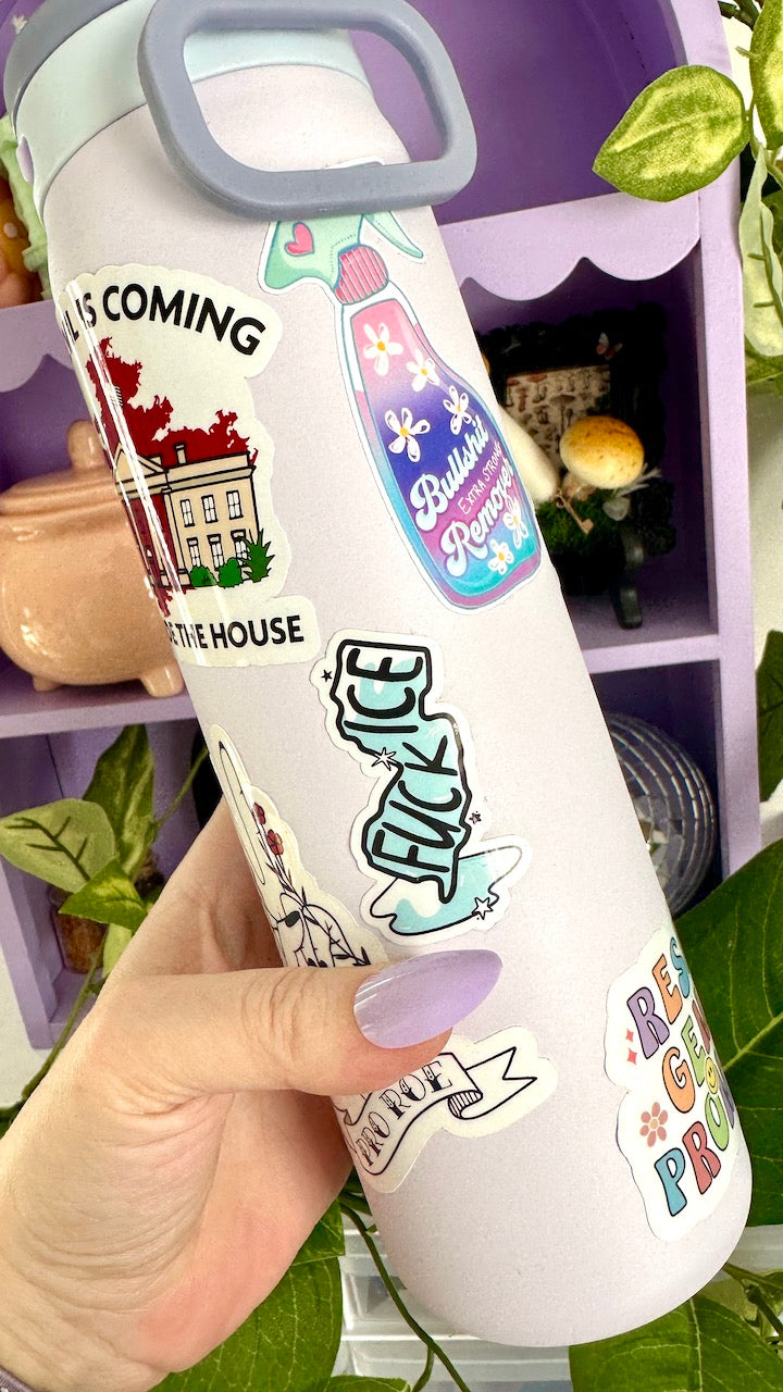 White water bottle sticker that says FUCK ICE text in black set on a blue icy drawing of the state of New Jersey shape with a little icy patch at the bottom