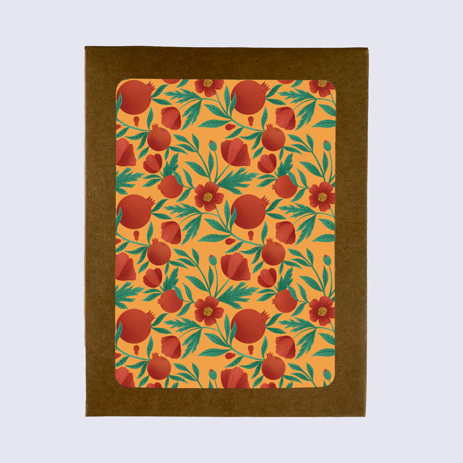 greeting card with pomegranates and poppies on an orange background