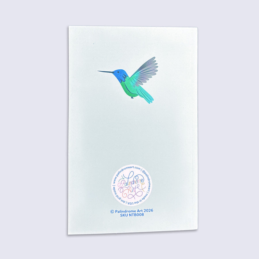 back cover of a journal with a hummingbird illustration