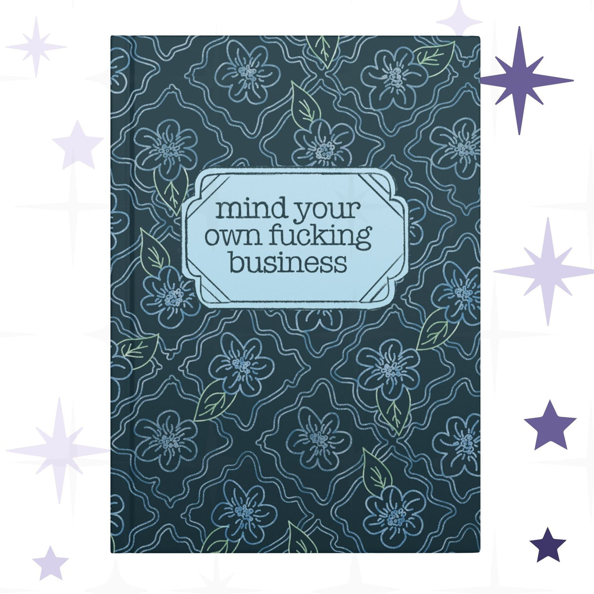 Profanity floral hardcover journal with teal botanical pattern and vintage label reading mind your own fucking business in retro serif type