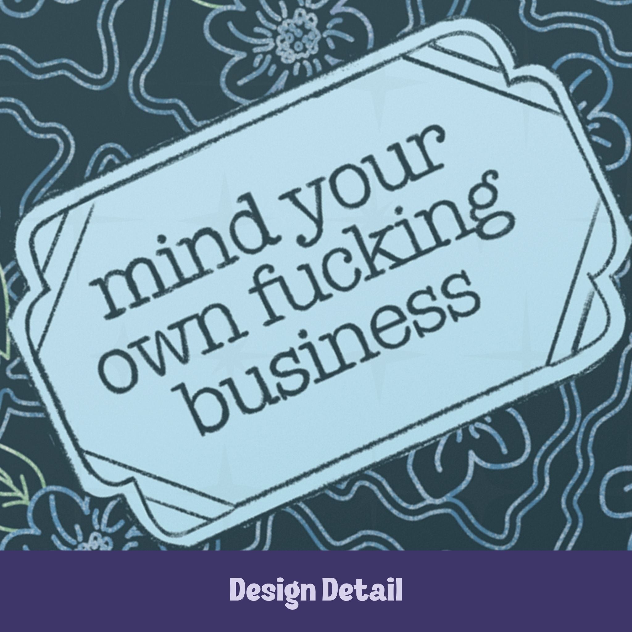 Close-up detail of vintage label reading mind your own fucking business in retro serif type on teal floral hardcover journal