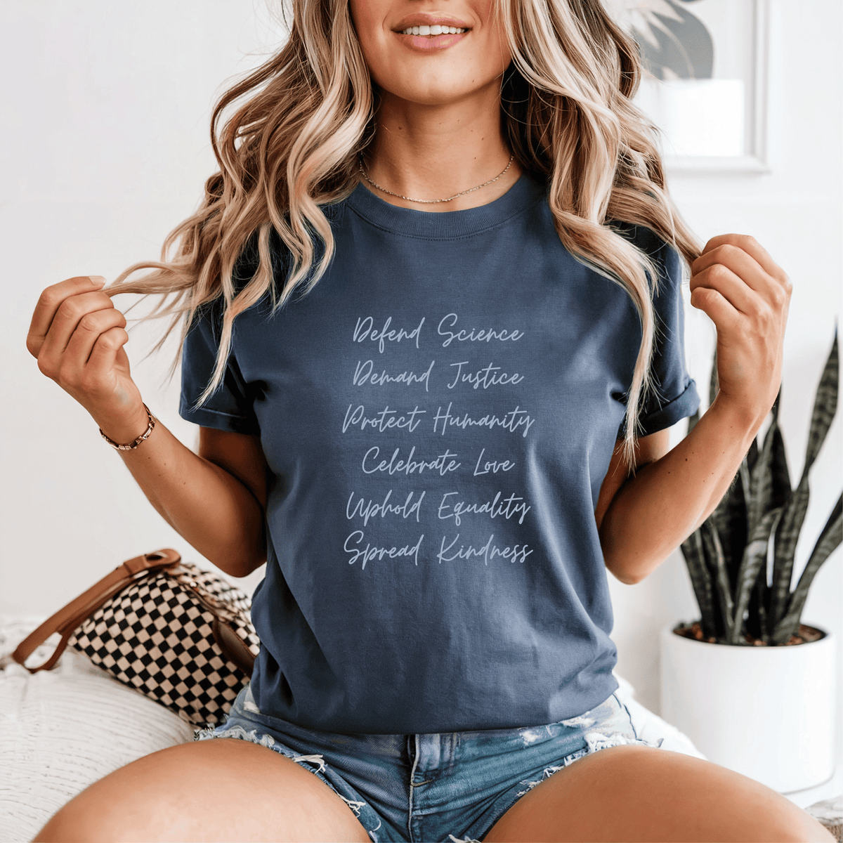 Defend Science Demand Justice Protect Humanity Celebrate Love Uphold Equality Spread Kindness progressive graphic t-shirt on Comfort Colors denim blue shirt
