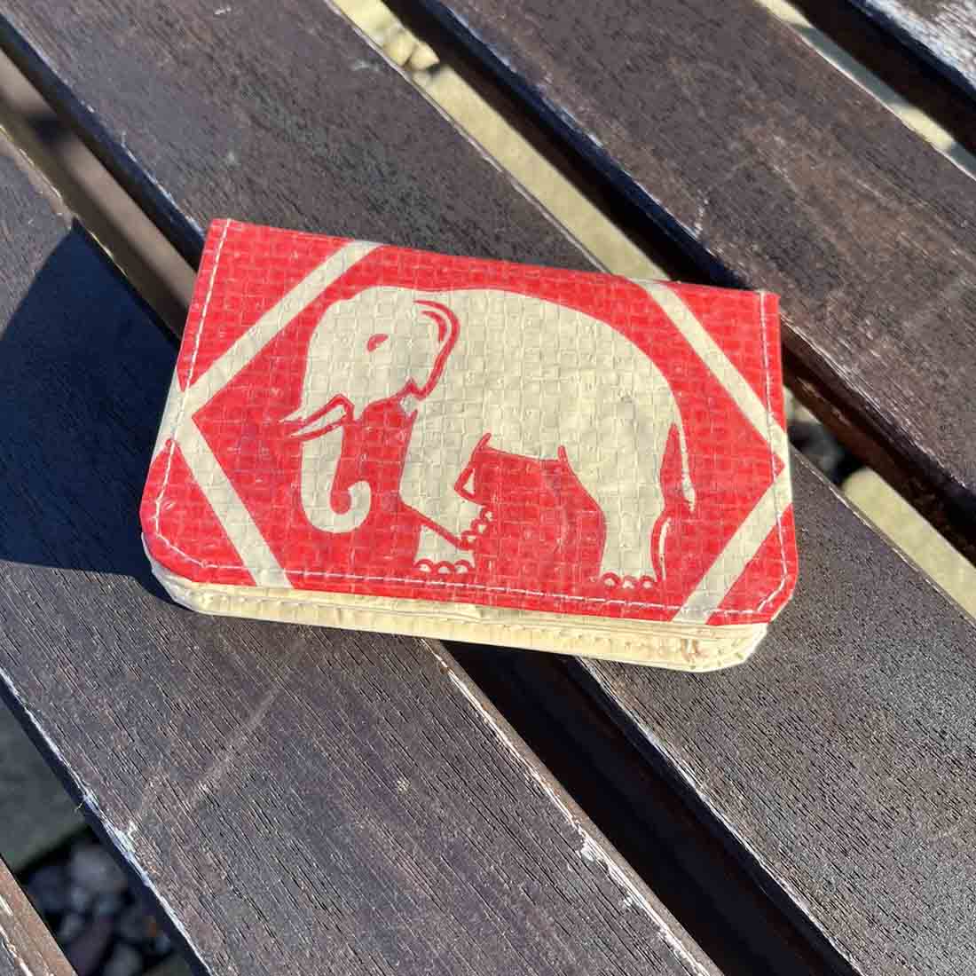 small red recycled cardholder with elephant design