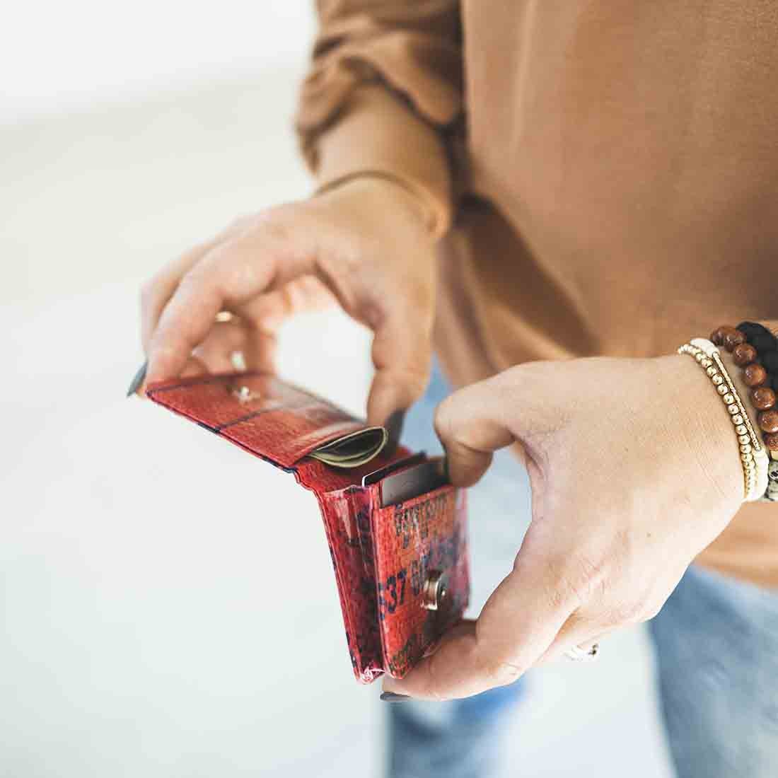 woman holding slim recycled cardholder