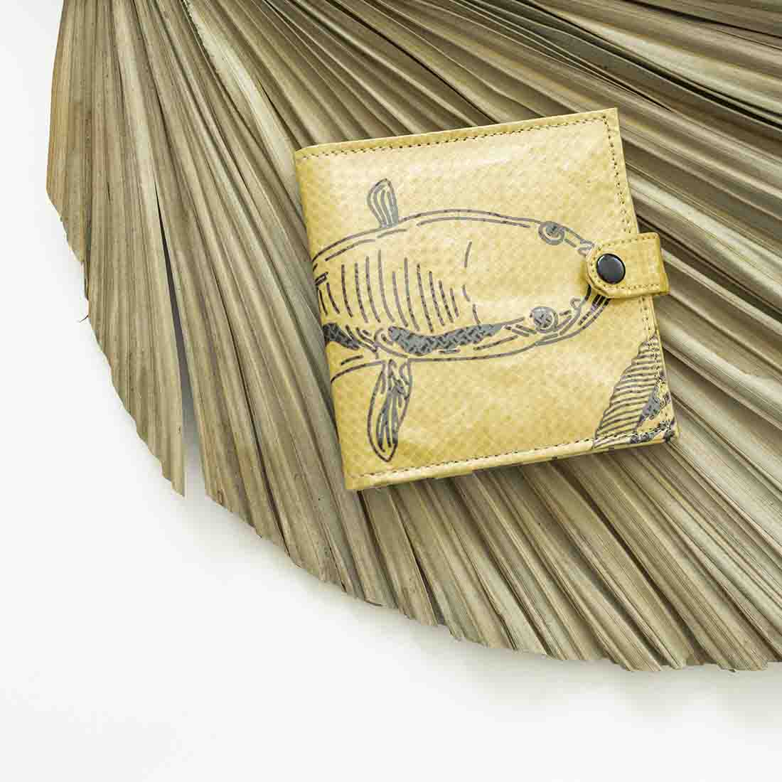 yellow recycled feed bag wallet with fish design