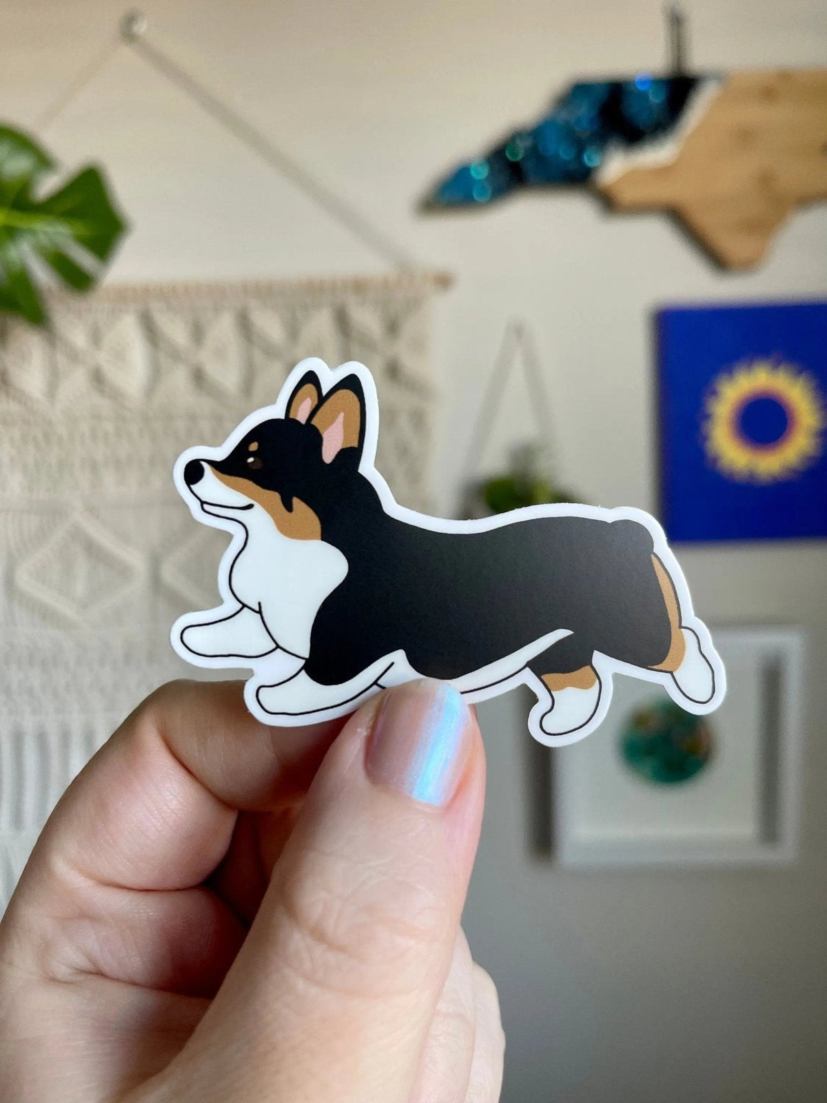Running Corgi Sticker — illustrated tri color Pembroke Welsh corgi mid run, waterproof vinyl sticker, by MangoIllustrated