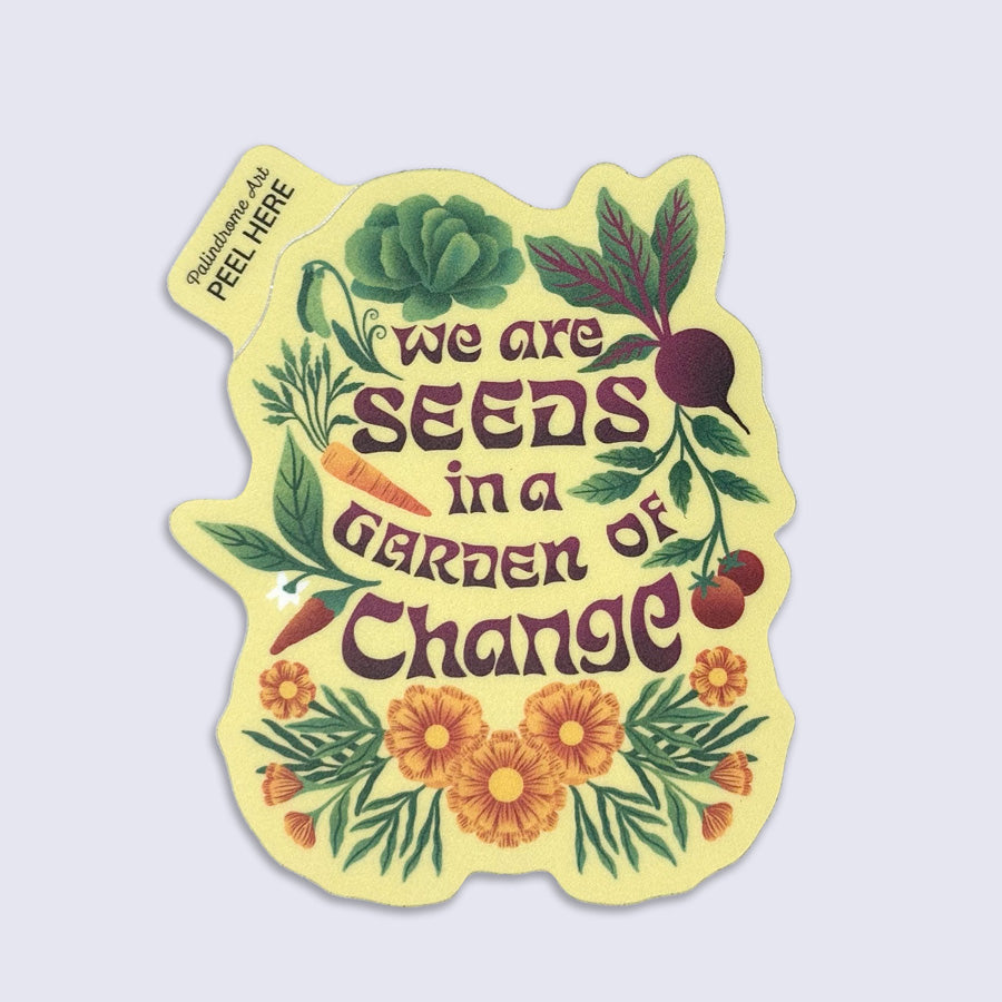 Sticker with garden-themed design and lettering "we are seeds in a garden of change"