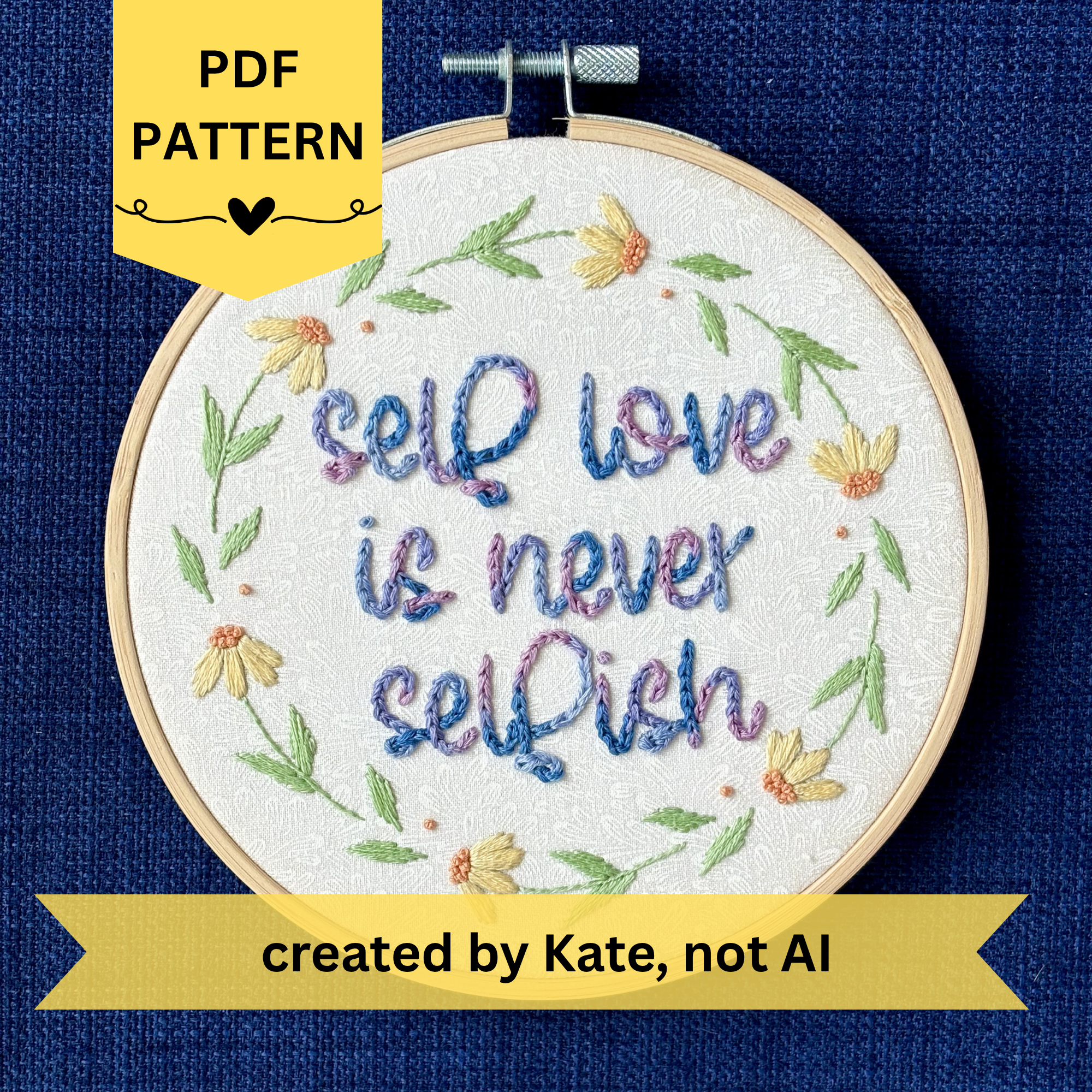PDF pattern created by Kate, not AI. "self love is never selfish." Quote hand embroidered in color changing thread of pink, lavender, light blue, and royal blue. Surrounding the quote is a floral wreath of yellow and orange daisies. Sewn on white-on-white cotton. Finished wall art is framed in a light wood embroidery hoop.