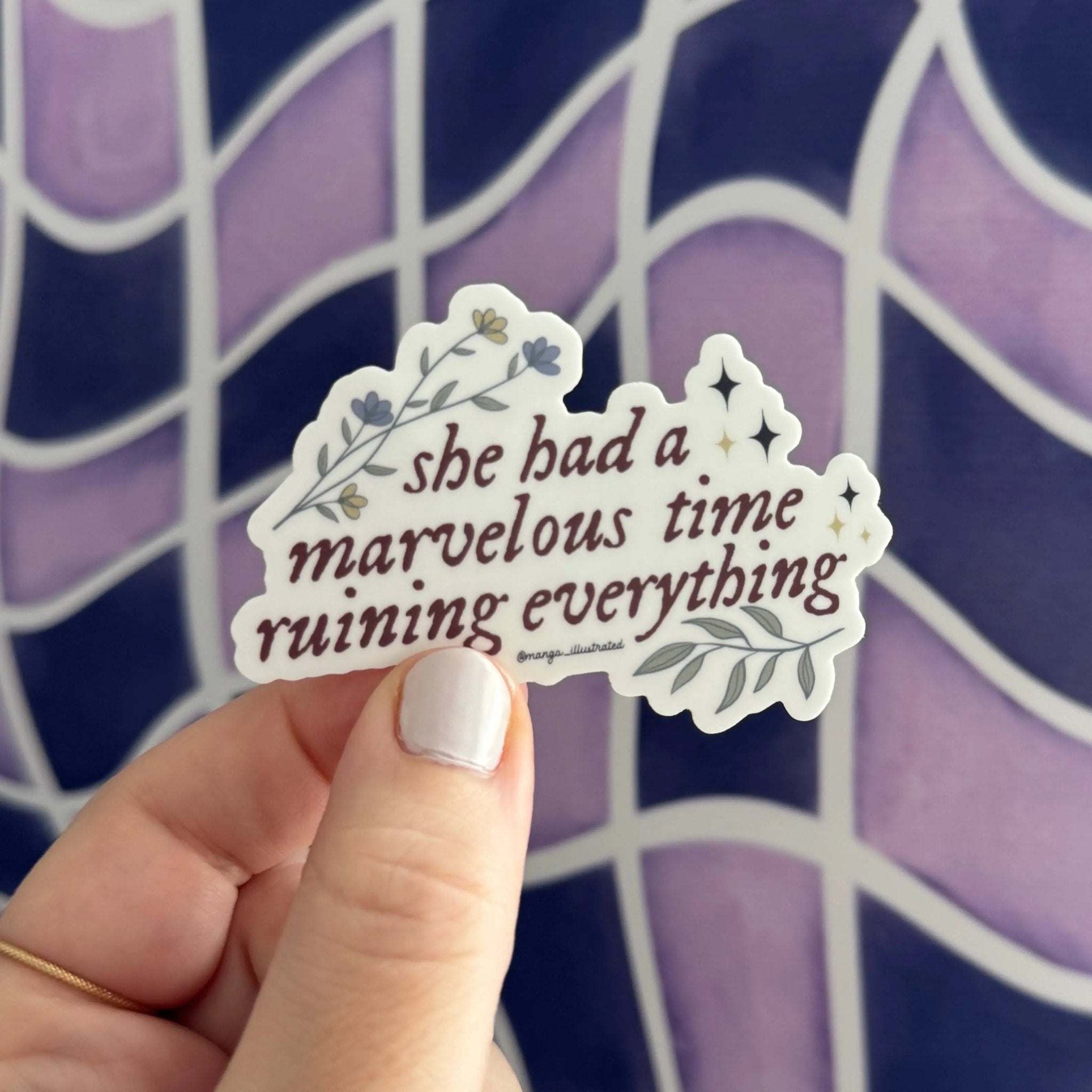 She had a marvelous time ruining everything sticker flat lay — folklore era quote laptop sticker by indie artist MangoIllustrated