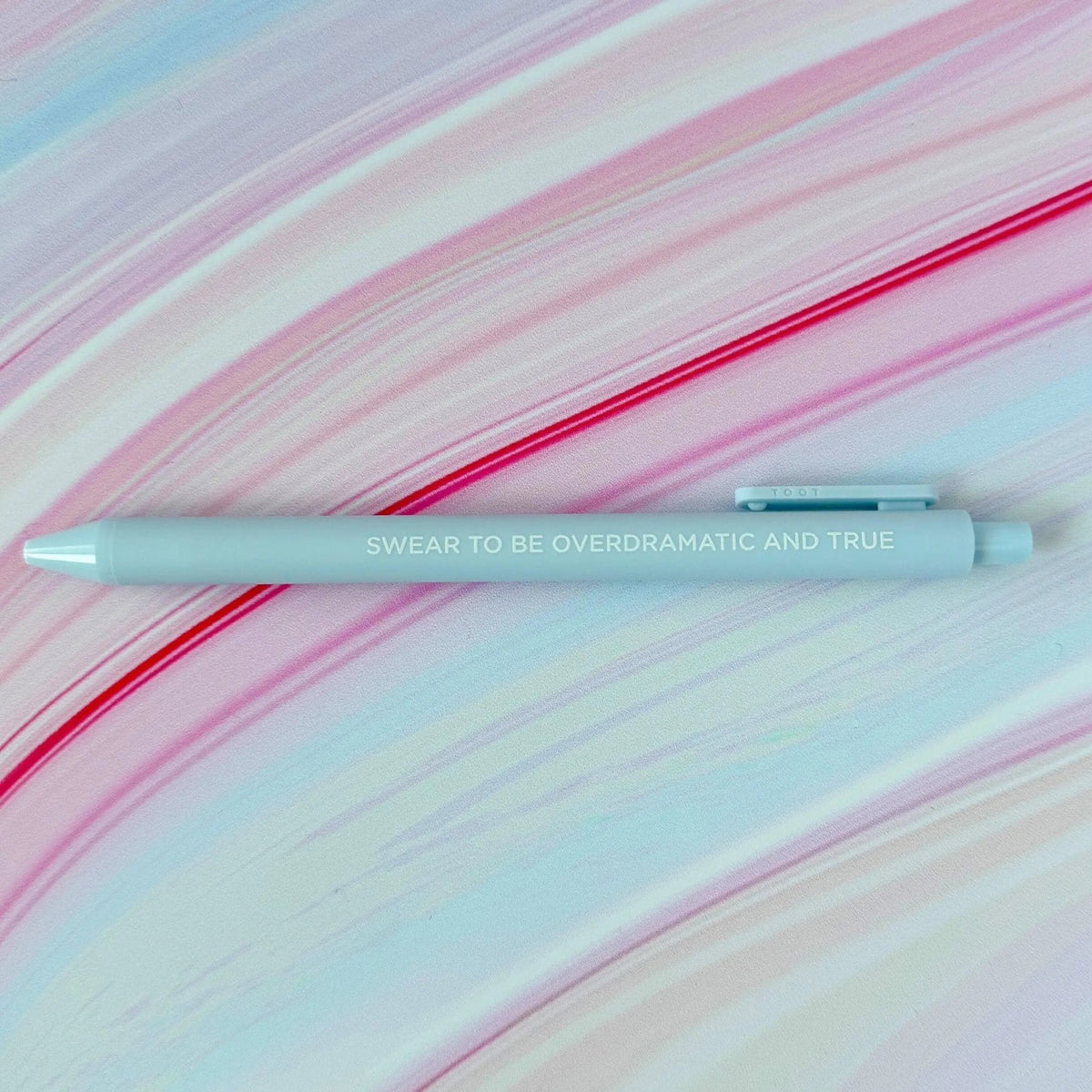 Swear to be overdramatic and true pen flat lay — powder blue gel pen stationery gift by indie artist MangoIllustrated