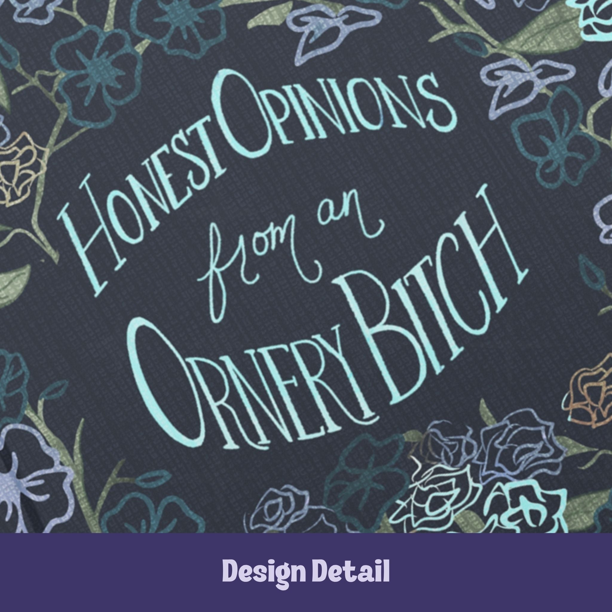 Close-up detail of hand-lettered text reading Honest Opinions from an Ornery Bitch in mint and seafoam typography on dark floral hardcover journal