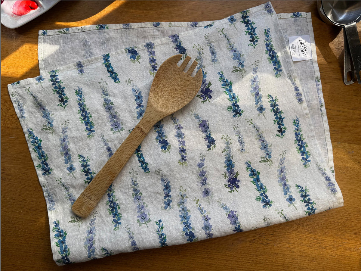 dancing delphinium linen tea towel