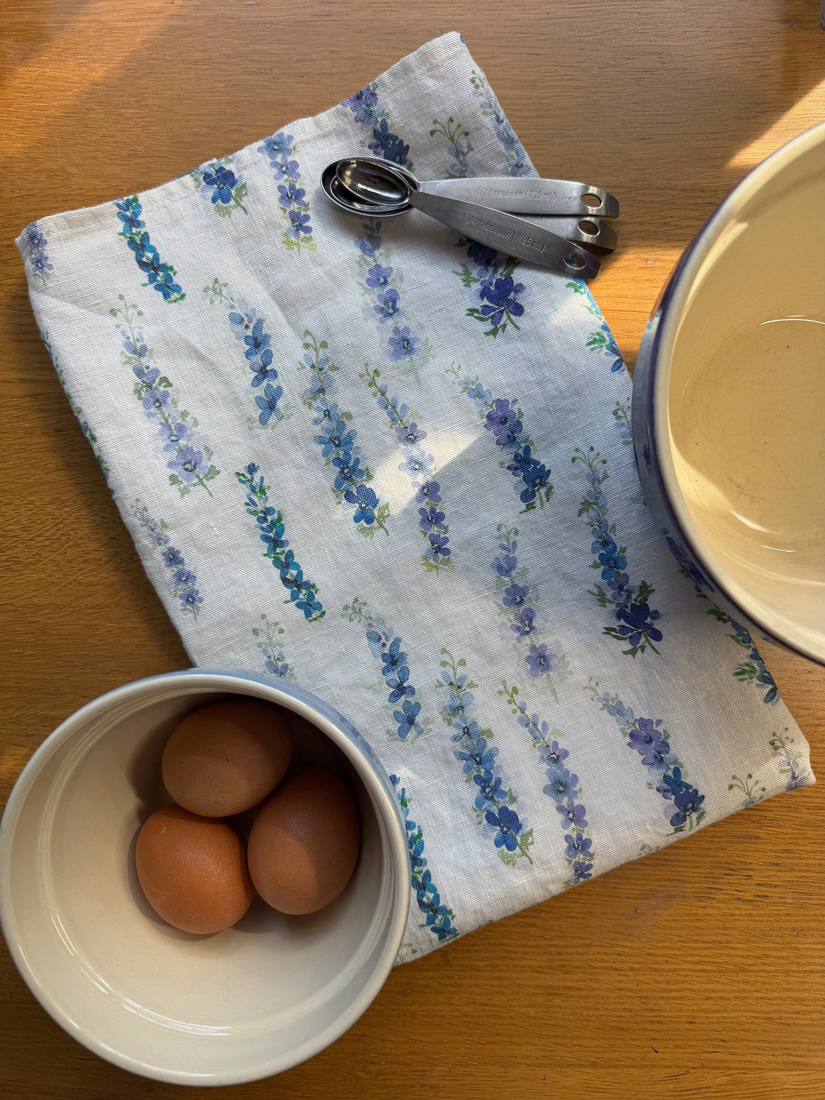 dancing delphinium linen tea towel