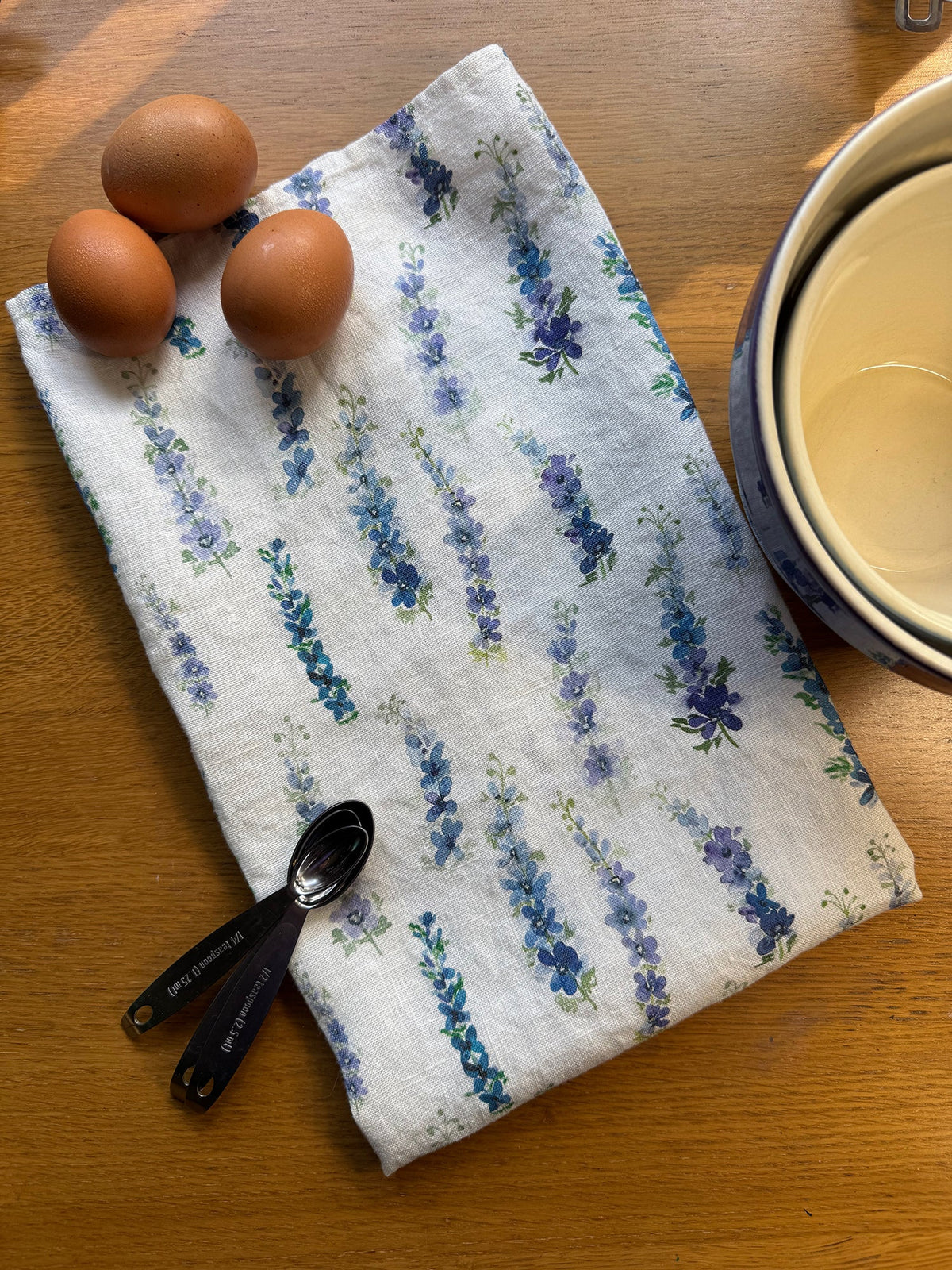 dancing delphinium linen tea towel