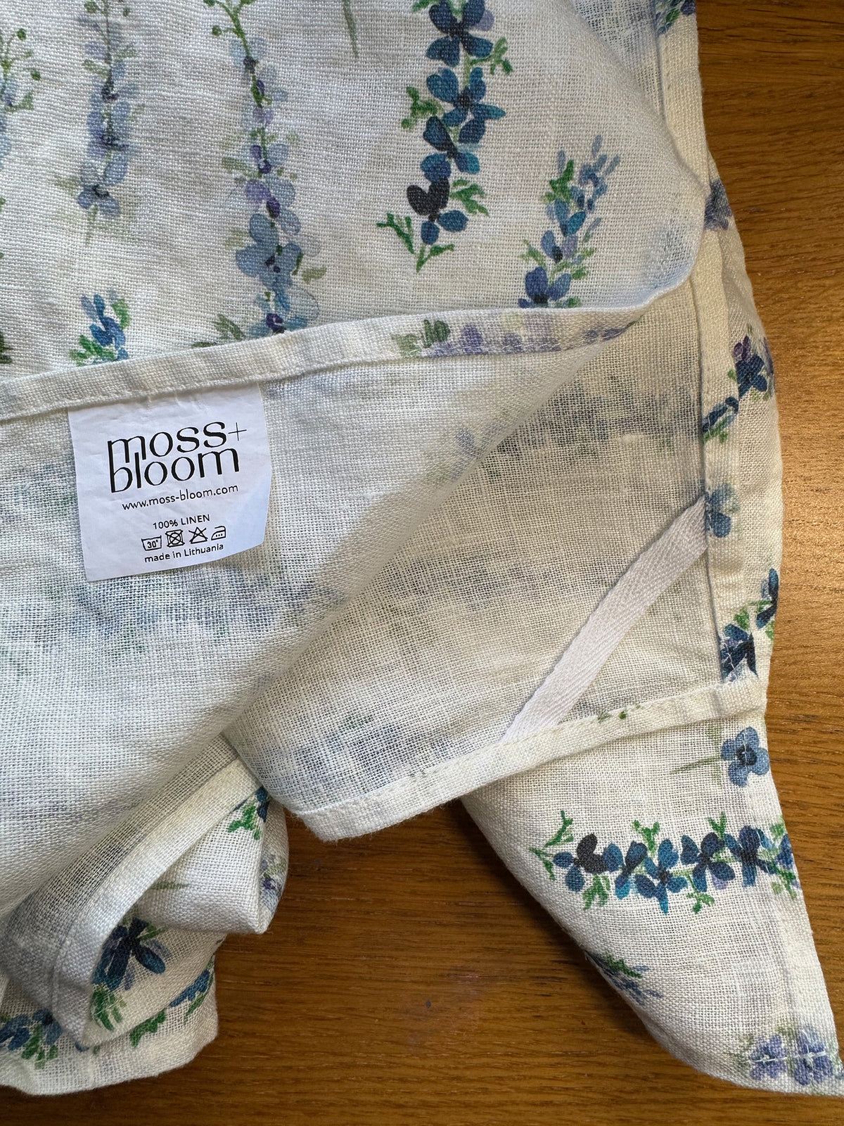 dancing delphinium linen tea towel