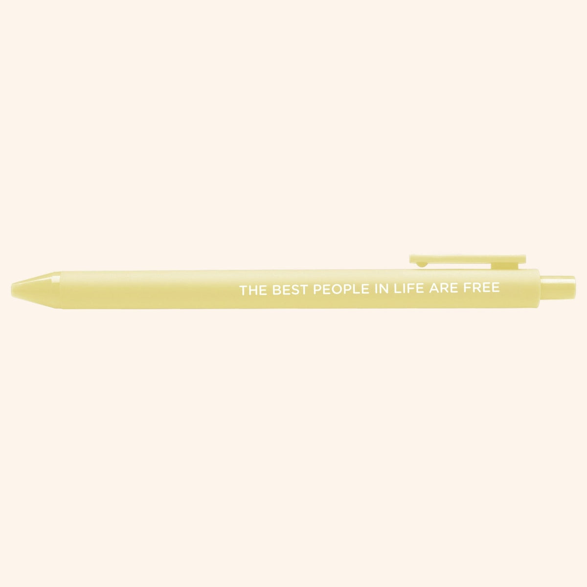 The Best People in Life Are Free jotter pen styled shot — banana yellow jotter pen as a desk gift and stocking stuffer by MangoIllustrated