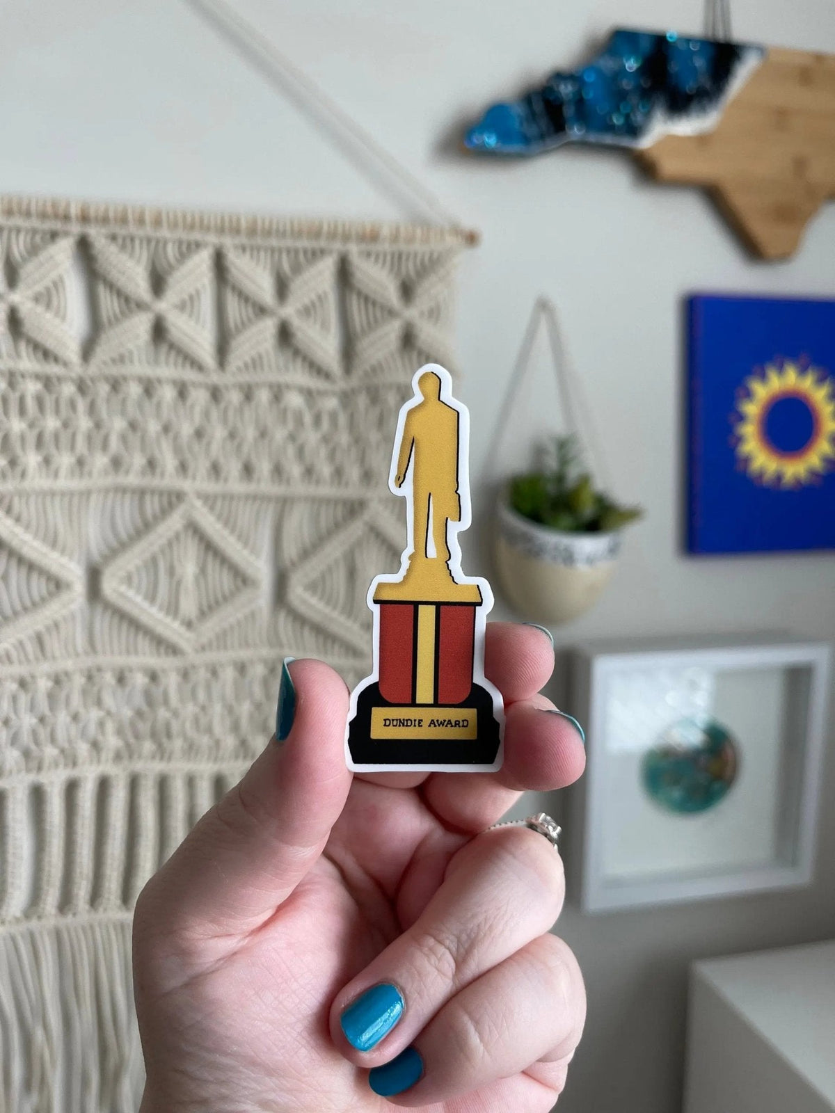 The Office Dundie Award sticker — illustrated gold award trophy design, waterproof vinyl sticker, by MangoIllustrated