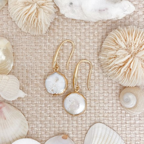 the beach and back small freshwater disc pearls on tan woven background with shells drops