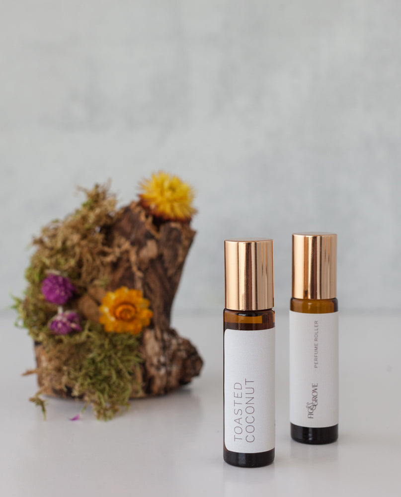 Toasted Coconut perfume roller bottle from Fig & Grove with a warm coconut natural fragrance blend