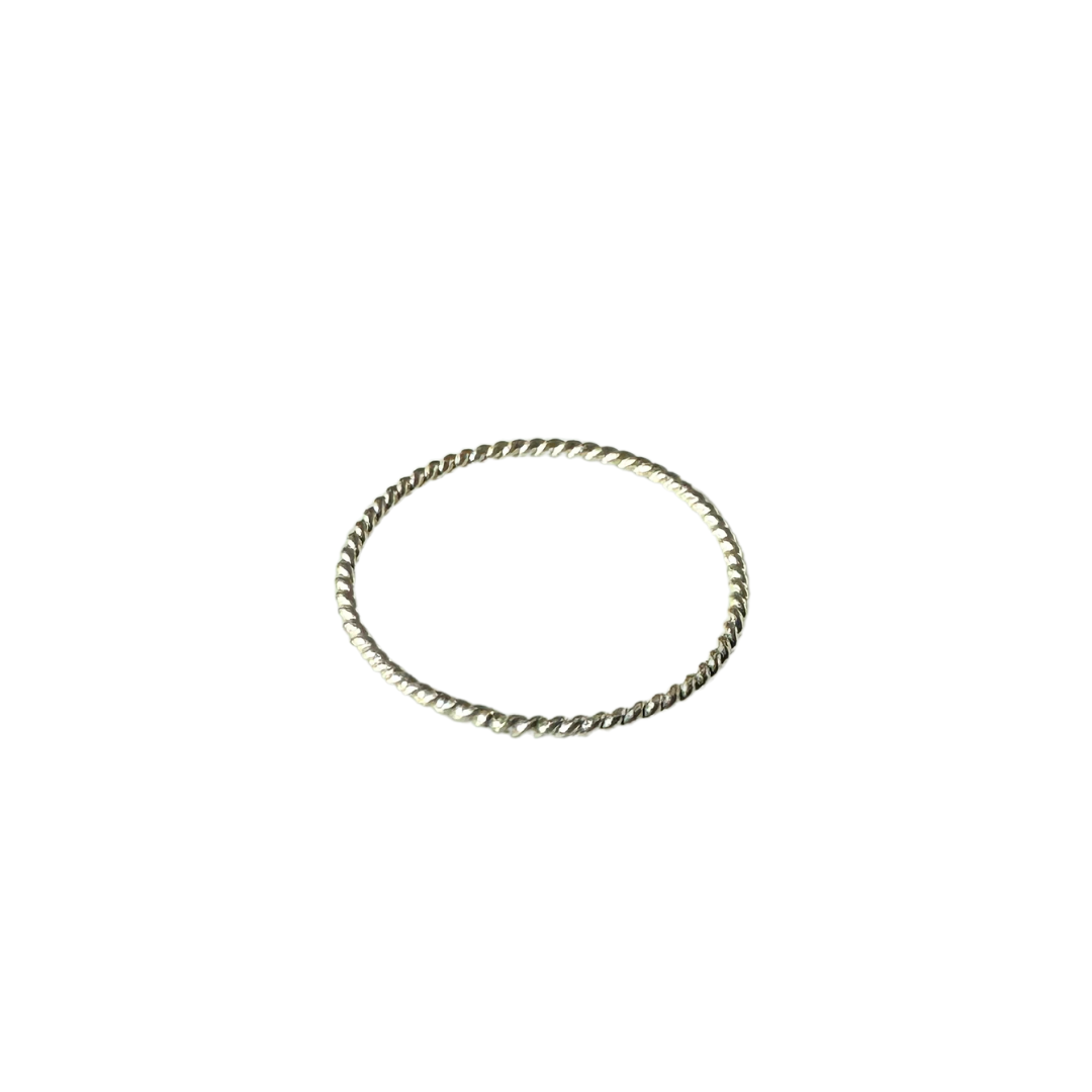 A sterling silver twist pattern ring-style stacking ring on a white background.