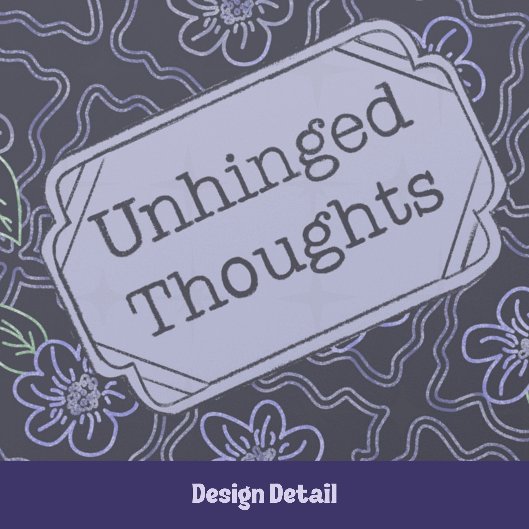 Close-up of hand-lettered Unhinged Thoughts text inside vintage cartouche label on dark floral journal cover showing chalky letterforms and lavender botanical pattern
