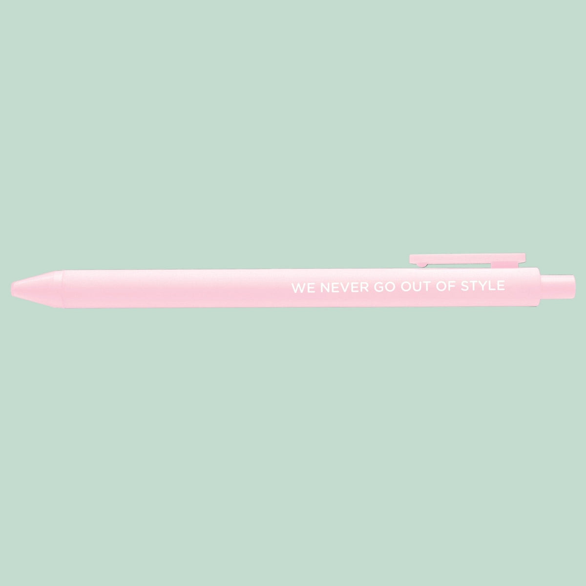 We never go out of style pen styled on a desk — blush pink jotter gel pen by indie artist MangoIllustrated