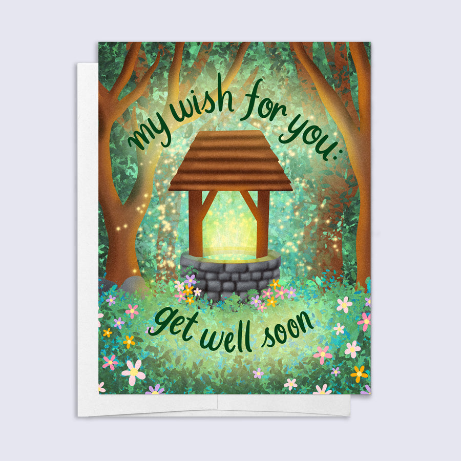 Greeting card with a wishing well in a forest and &