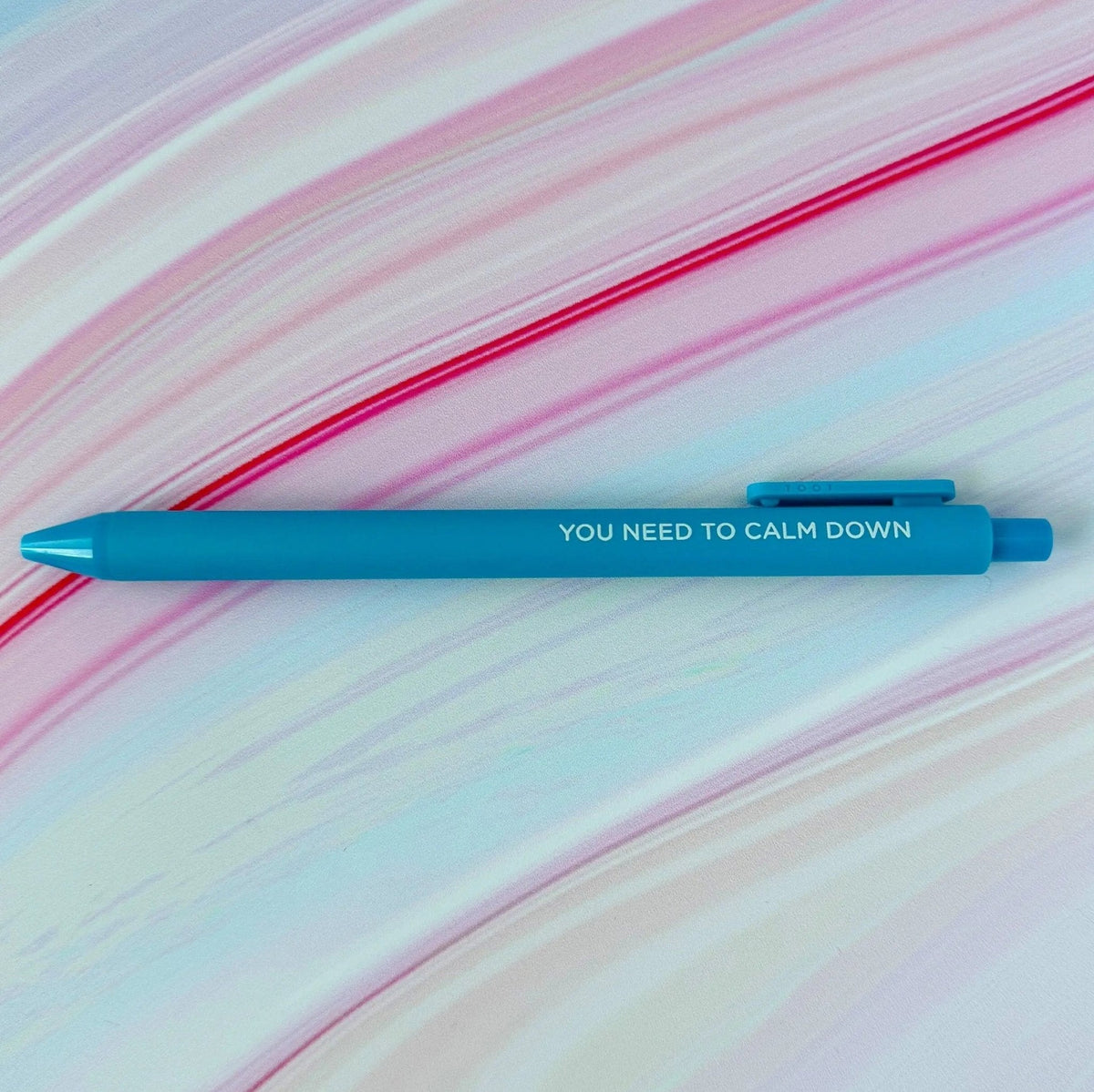 You Need to Calm Down jotter gel pen flat lay — bright blue gel pen stationery gift by indie artist MangoIllustrated