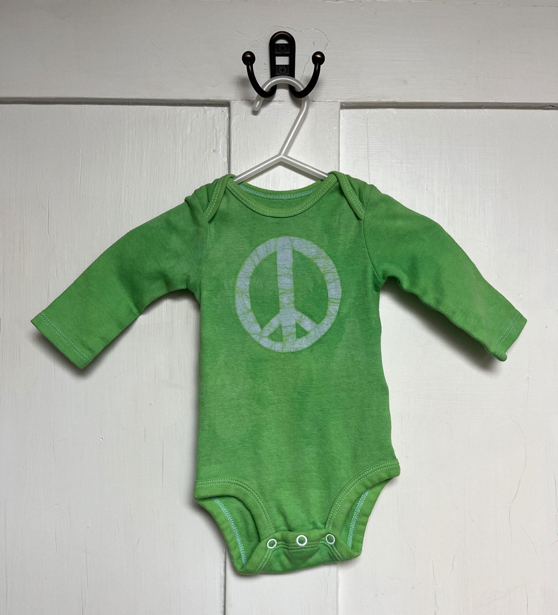 Long sleeve peace sign baby bodysuit