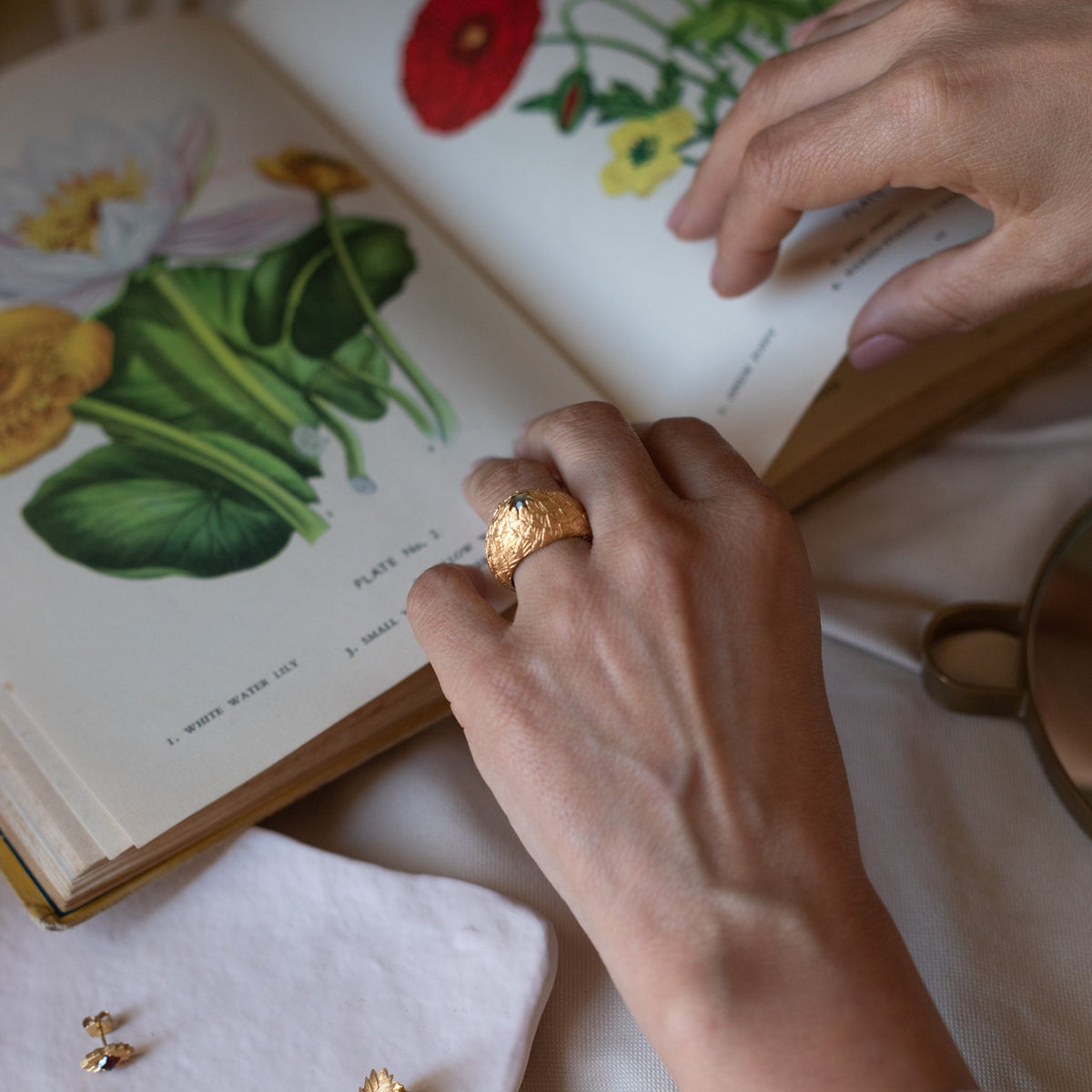 Fair trade gold and tourmaline ring, on model