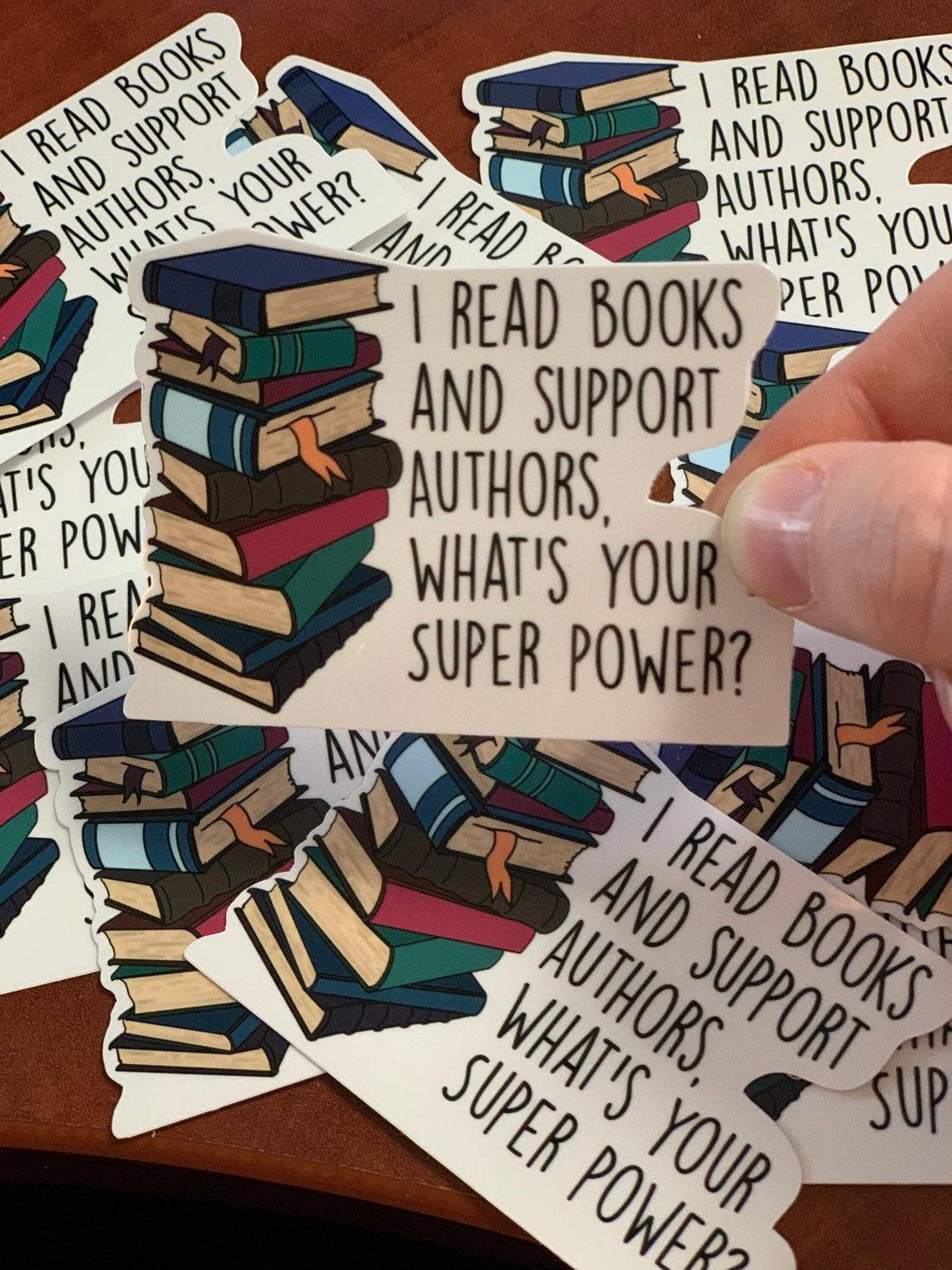 Sticker with book illustration and text &