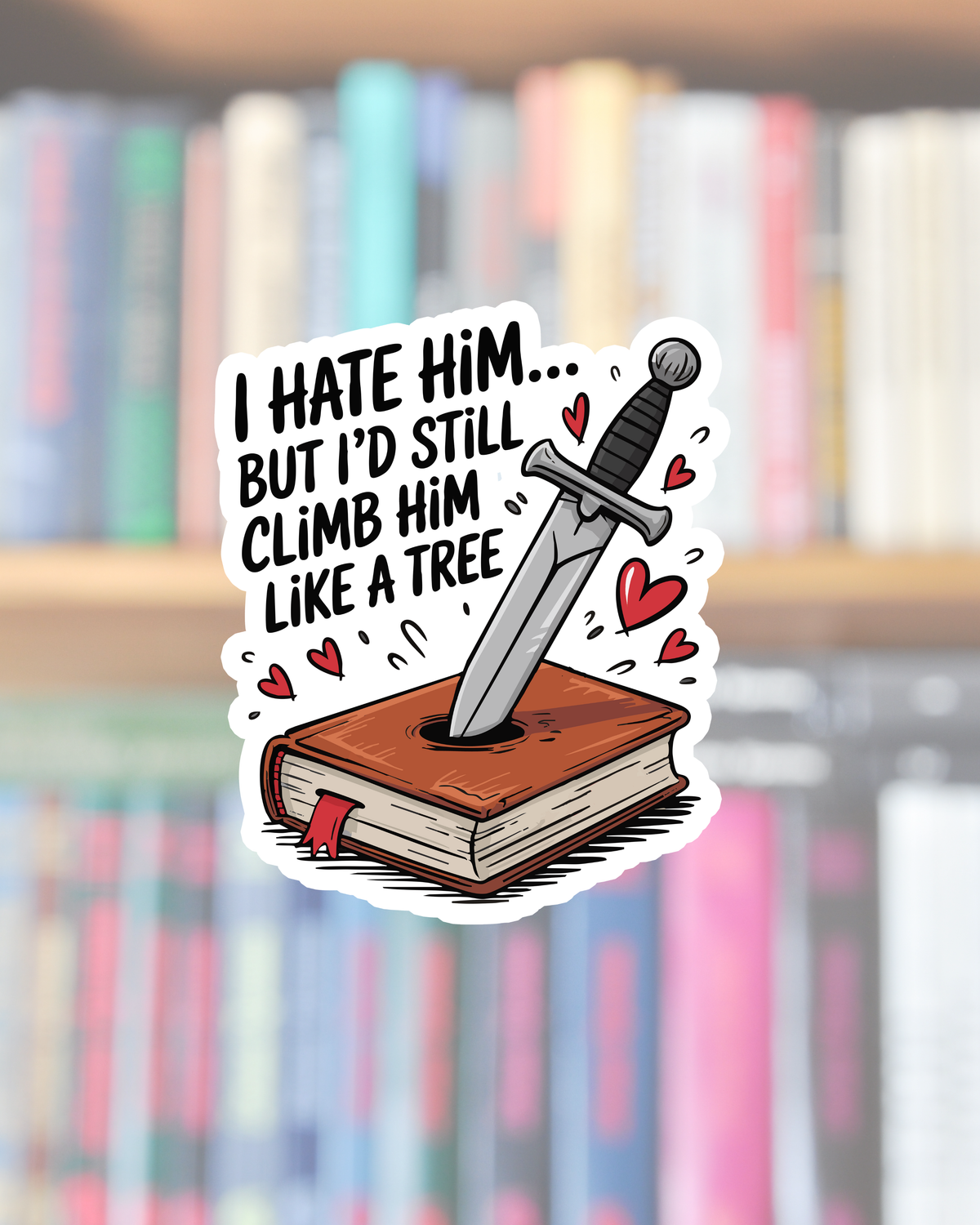 Sticker with a sword on a book and text in front of a blurred bookshelf background