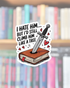 Sticker with a sword on a book and text in front of a blurred bookshelf background