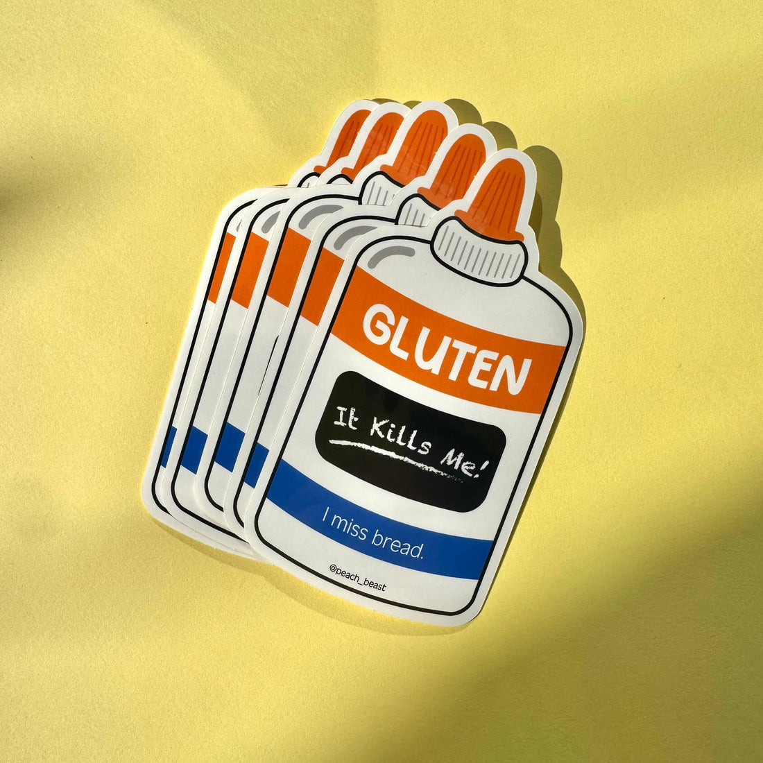 Sticker with gluten-themed design on a yellow background