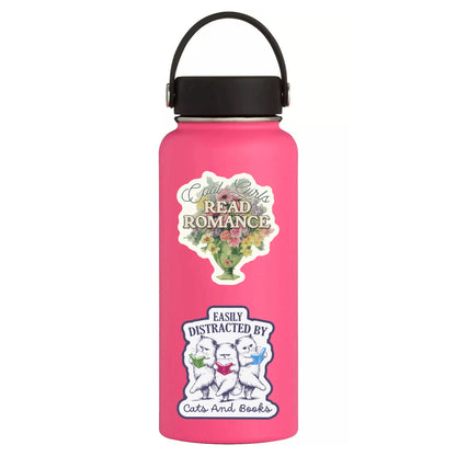 Pink water bottle with stickers on a white background