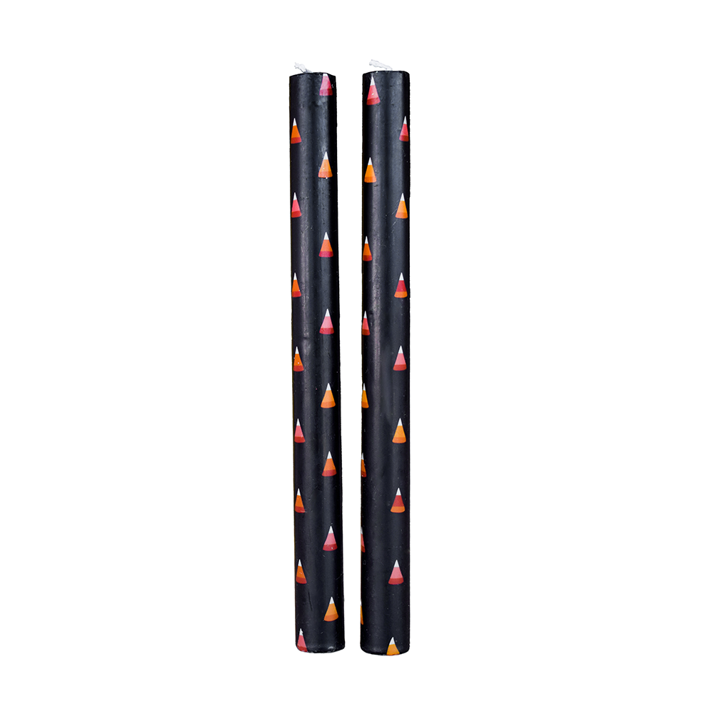 Trick or Treat Street candy corn taper candle set, matte black with coral and cream accents.