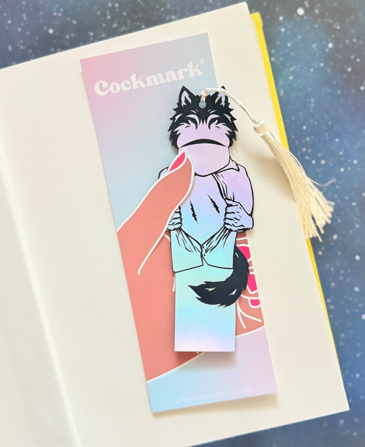 Colorful bookmark with a character design on a blue background