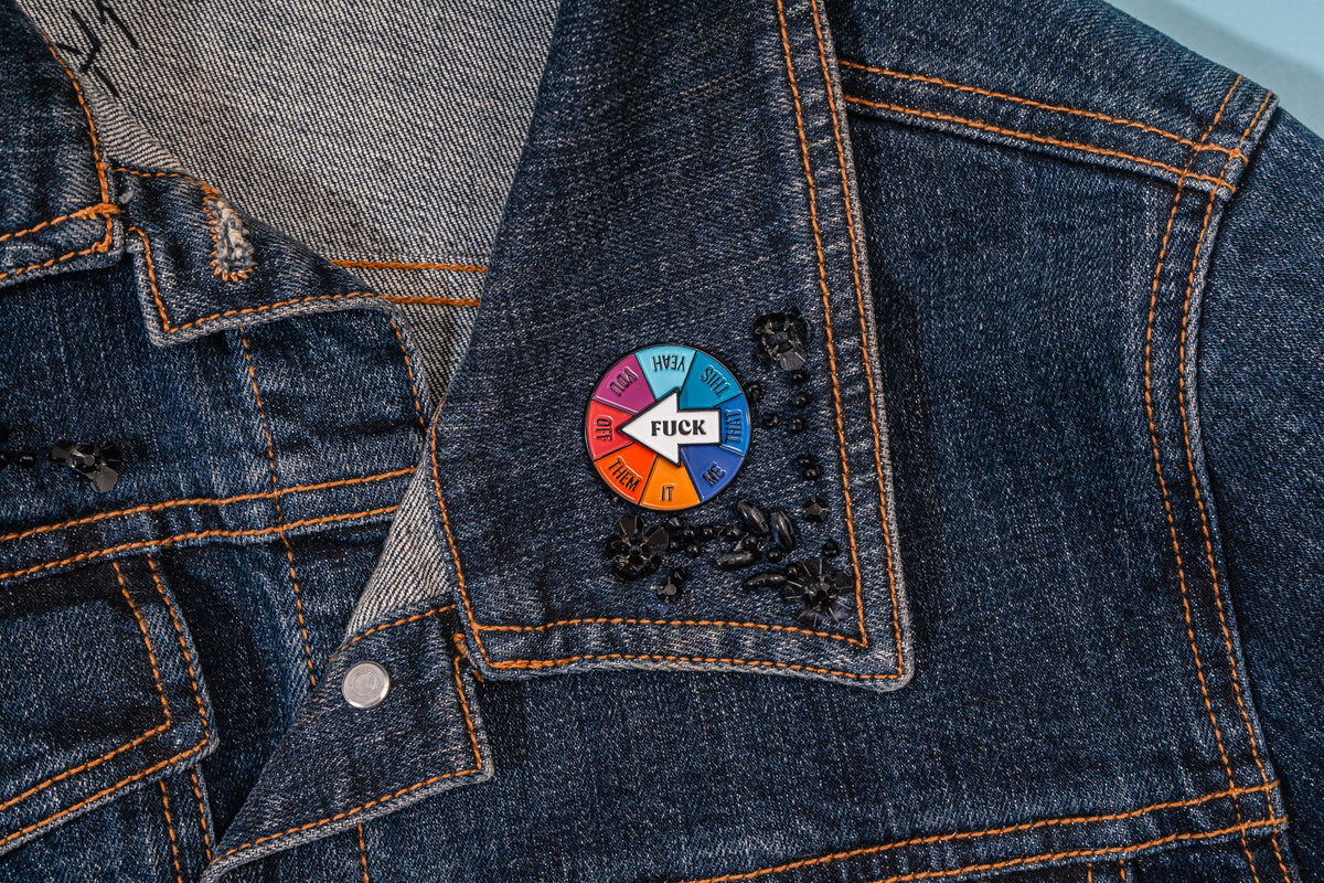 Colorful pin on a denim jacket