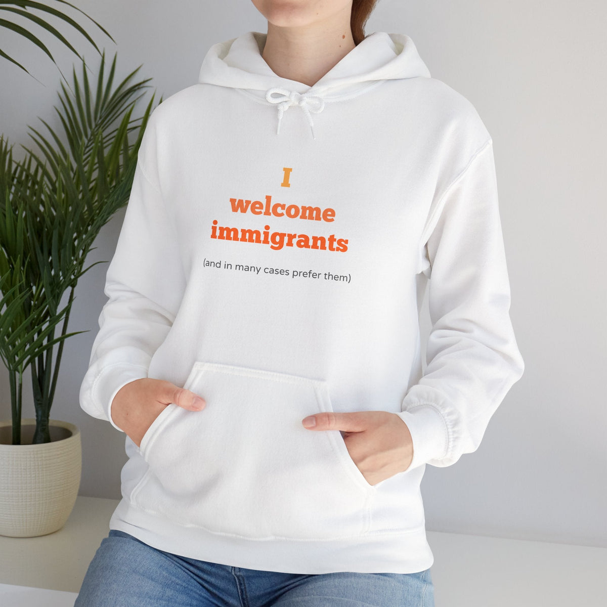 "I welcome immigrants (and in many cases prefer them)" on Unisex Heavy Blend™ Hooded Sweatshirt