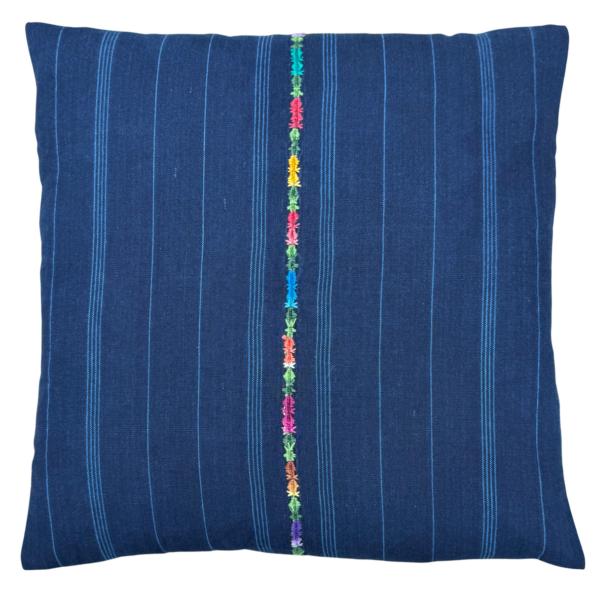 Blue pillow with colorful vertical stripe on a white background