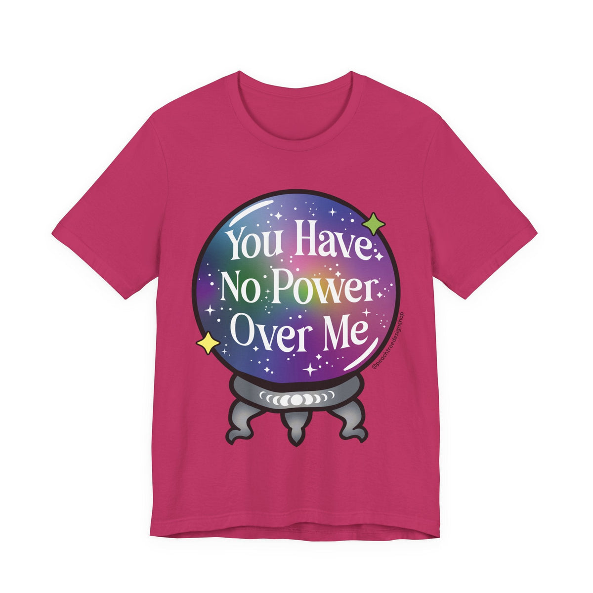 A bright pink short-sleeve t-shirt with a graphic of a crystal ball containing a purple galaxy background and the text &